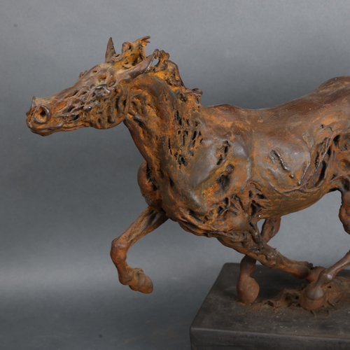 3475 - Natural History : A stylised composite study of a galloping horse, on stand, unsigned, height 37cm.