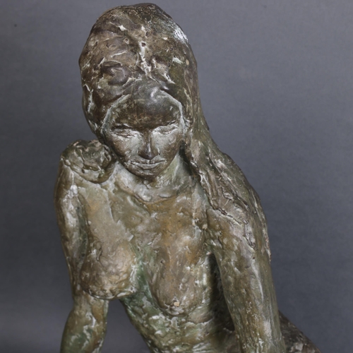 3477 - Art School : A textured fibreglass study of a seated female nude, unsigned, height 38cm.