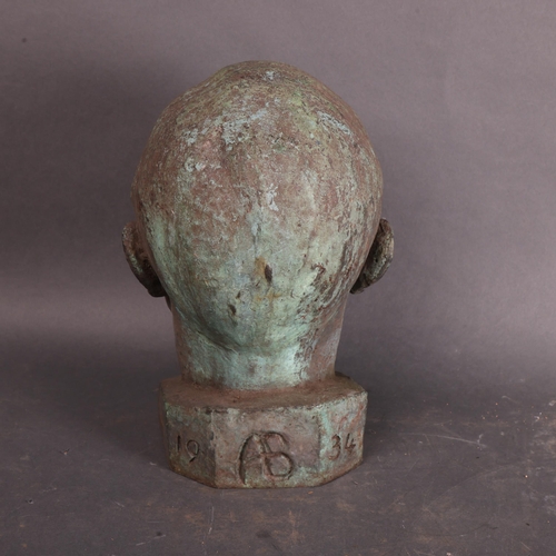 3478 - Art Class : A vert-de-gris cast iron bust of a man, signed with monogram 'AB', dated 1934, height 28... 