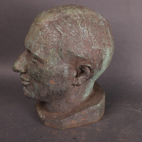 3478 - Art Class : A vert-de-gris cast iron bust of a man, signed with monogram 'AB', dated 1934, height 28... 