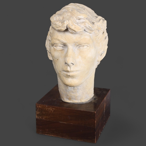 3479 - Art Pottery : A texture plaster bust of a man, on stand, unsigned, height 37cm.