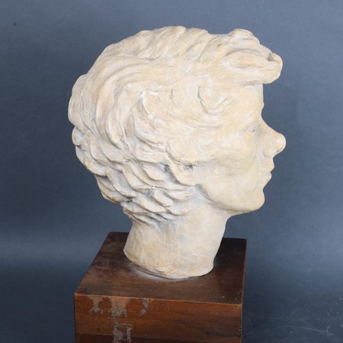 3479 - Art Pottery : A texture plaster bust of a man, on stand, unsigned, height 37cm.