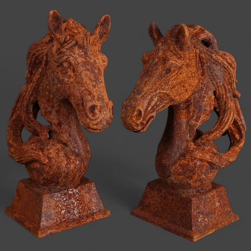 3490 - A pair of cast iron Horse head finials, unsigned, height 45cm, (2).