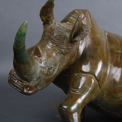 3491 - Natural History : African verdite rhino sculpture, unsigned, length approx 39cm