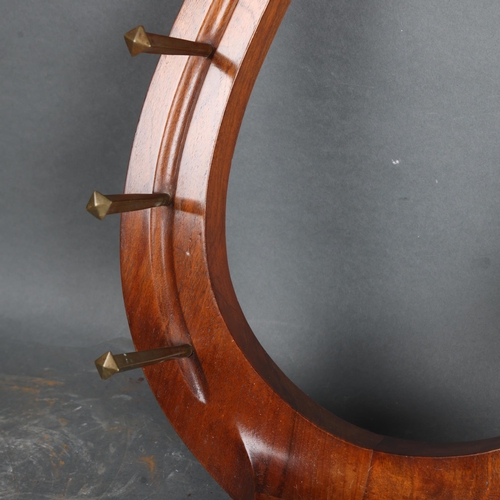 3503 - A mahogany horseshoe whip rack, overall length 47cm.