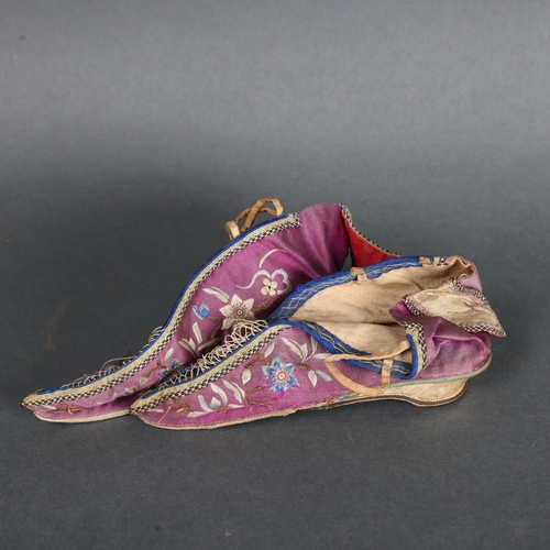 3530 - A pair of Antique Chinese embroidered silk binding shoes.