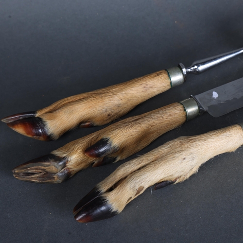 3543 - Taxidermy: Deer Hoof handled Meat Carving Cutlery set. The hooves from a roe deer. Comprising a carv... 