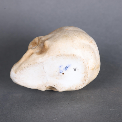 3546 - Curiosity/Macabre: An Antique porcelain ink-well in the form of a skull with glass eyes, height 7cm.