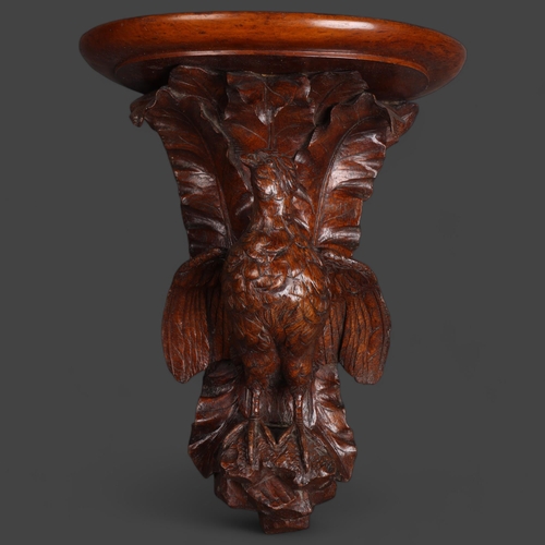 3557 - A stunning Black Forest carved wooden wall bracket, carving depicts an open winged Partridge bird, o... 