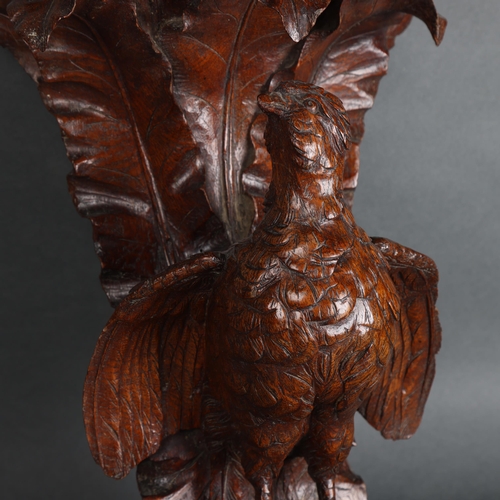 3557 - A stunning Black Forest carved wooden wall bracket, carving depicts an open winged Partridge bird, o... 