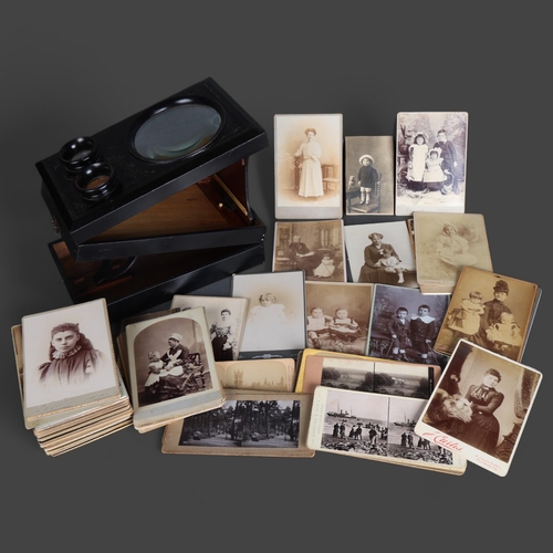 3561 - An Antique Ebonised Victorian stereoscope with a selection of period photocards.