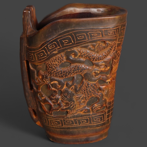 3576 - Chinese Carved Horn Libation Cup.
Hand carved horn libation cup or wine cup / beaker. With intricate... 