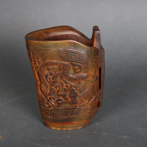 3576 - Chinese Carved Horn Libation Cup.
Hand carved horn libation cup or wine cup / beaker. With intricate... 