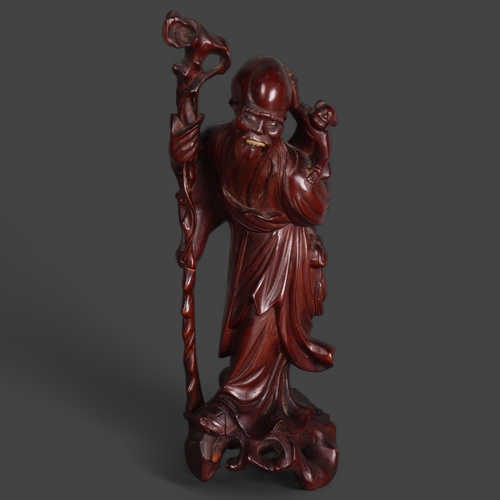 3577 - Chinese Hardwood Carving of The God of Longevity Shoulao, 19th century.
The God holding staff and wi... 