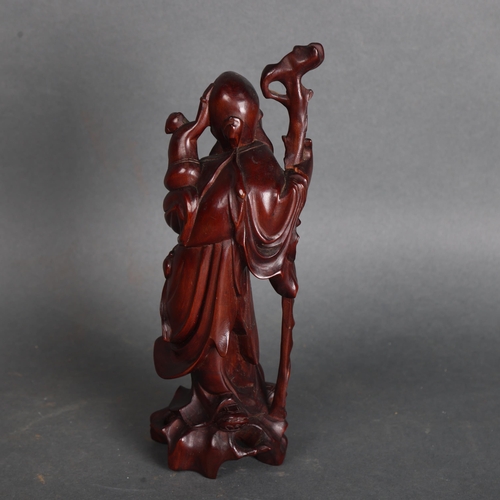 3577 - Chinese Hardwood Carving of The God of Longevity Shoulao, 19th century.
The God holding staff and wi... 