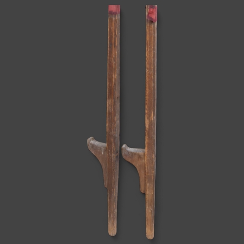 3588 - Curiosity/Macabre : a pair of antique pine stilts, unmarked, overall length of each 210cm.