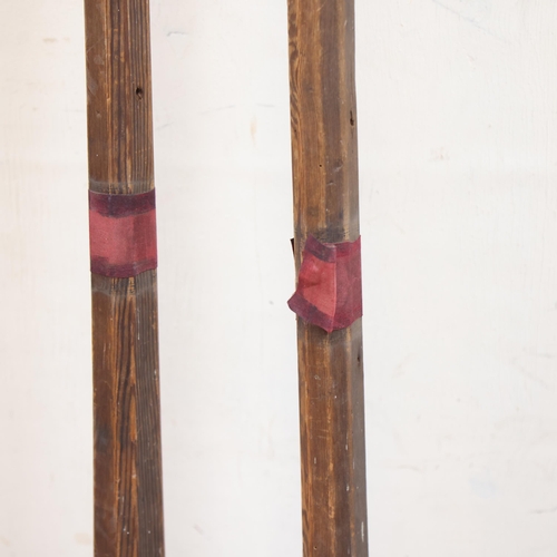 3588 - Curiosity/Macabre : a pair of antique pine stilts, unmarked, overall length of each 210cm.