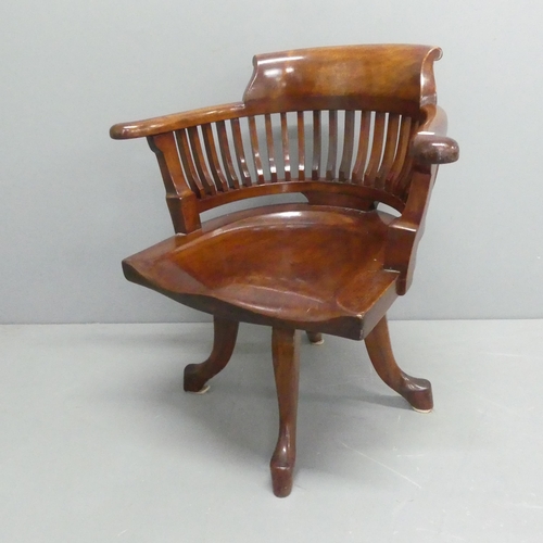 2344 - A mahogany Arts & Crafts style swivel desk chair.