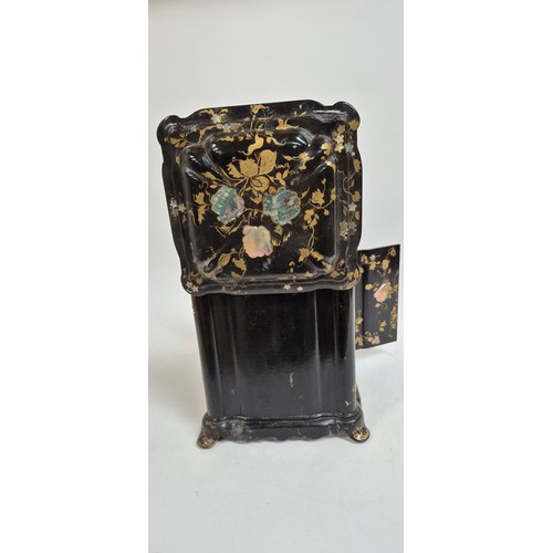 1 - A 19th century papier mache travelling writing/jewellery box, with lid opening to reveal a red velve... 