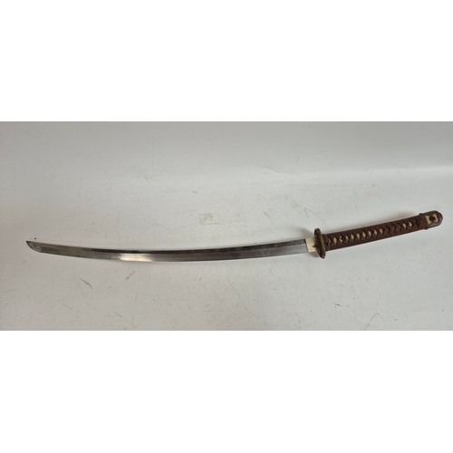 20 - A Japanese Shin Gunto Katana, and scabbard, having a 66cm plain chamfered steel blade, prunus decora... 