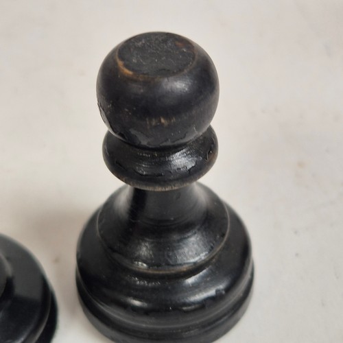 147 - A boxwood and ebony chess set, comprising Staunton and Jacques pieces, King height 8.7cm