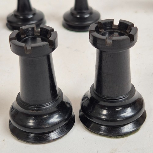 147 - A boxwood and ebony chess set, comprising Staunton and Jacques pieces, King height 8.7cm