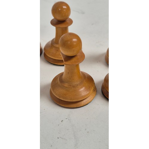 147 - A boxwood and ebony chess set, comprising Staunton and Jacques pieces, King height 8.7cm