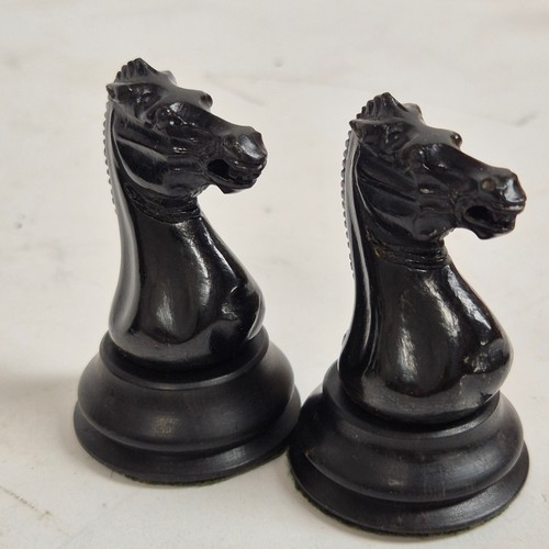 147 - A boxwood and ebony chess set, comprising Staunton and Jacques pieces, King height 8.7cm