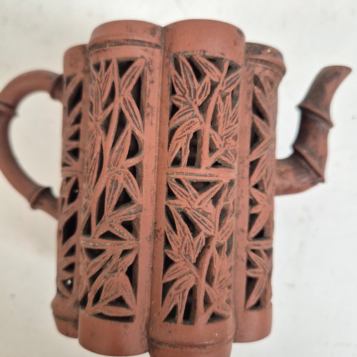 237 - A Chinese Yixing red stoneware reticulated 