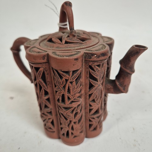 237 - A Chinese Yixing red stoneware reticulated 