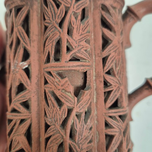 237 - A Chinese Yixing red stoneware reticulated 