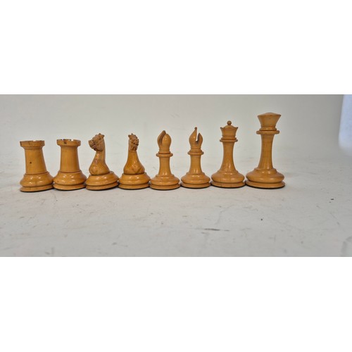 147 - A boxwood and ebony chess set, comprising Staunton and Jacques pieces, King height 8.7cm