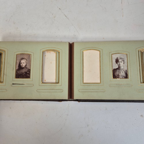 110 - 3 Vintage leather-bound photograph albums, containing various family photos, carte de visite, with 1... 