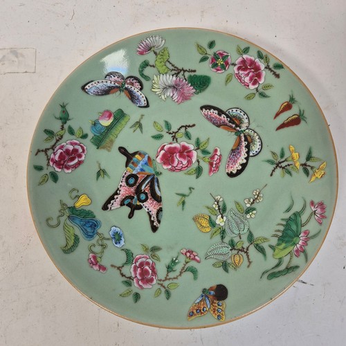 212 - A group of 4 Chinese celadon plates, hand painted butterfly decoration, diameter 26cm