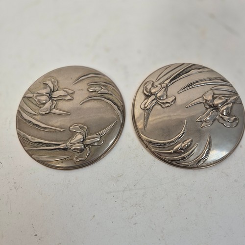 302 - An Art Nouveau style WMF silver plated stamp box, a pair of Art Nouveau pewter compact mirrors, 2 si... 