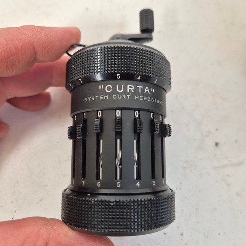 3214 - CURTA - a type I, number 8153, precision calculator, by Contina AG Mauren, with instruction booklet.