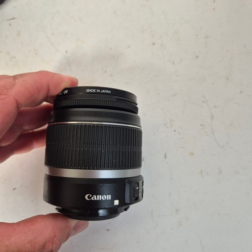 355 - A Canon EO5500D, and associated Canon zoom lenses, and a Sigma zoom lens 28-200mm, in original packa... 