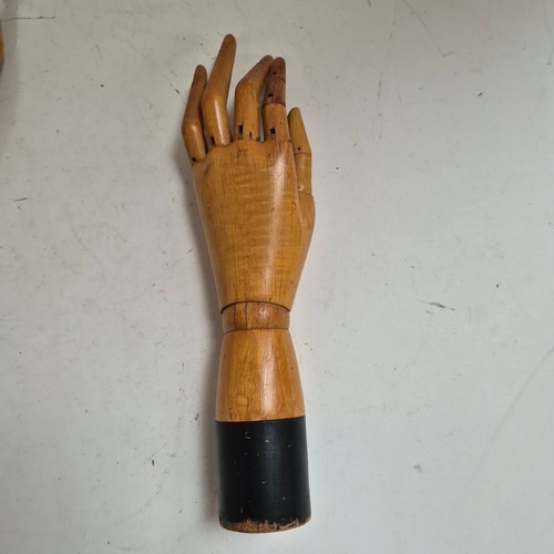 3524 - A group of three similar vintage carved wood articulated artist's hands, largest, height 30cm, (3)