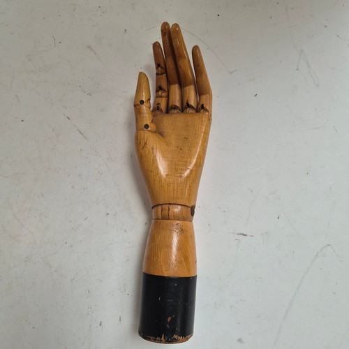 3524 - A group of three similar vintage carved wood articulated artist's hands, largest, height 30cm, (3)