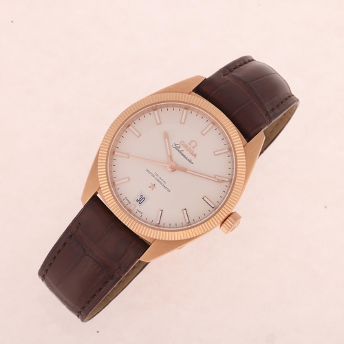 1005 - OMEGA - an 18k Sedna rose gold Constellation Globemaster Co-Axial Master Chronometer automatic calen... 