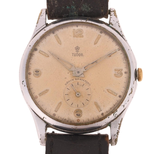 1011 - TUDOR - a Vintage stainless steel mechanical wristwatch, ref. 709, circa 1950s, silvered dial with a... 