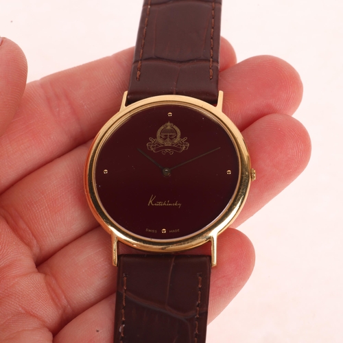 1012 - KUTCHINSKY - an 18ct gold 'Saudi Arabia Emblem' quartz wristwatch, maroon dial with gilt quarterly d... 