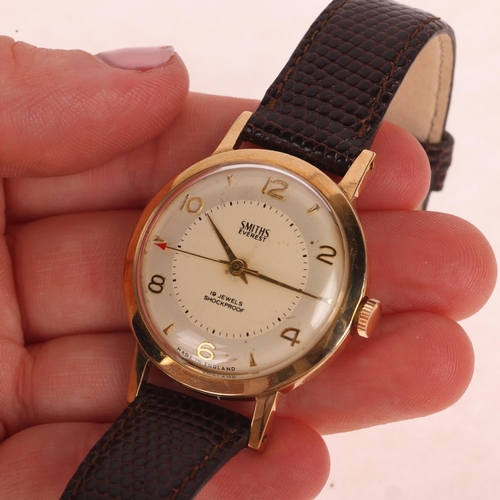 1015 - SMITHS - a Vintage 9ct gold Everest mechanical wristwatch, circa 1960s, silvered dial with applied g... 