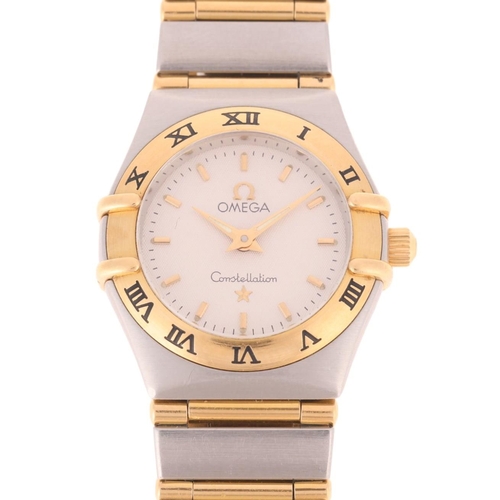 1031 - OMEGA - a lady's stainless steel and gold Constellation quartz bracelet watch, ref. 795.1203, circa ... 