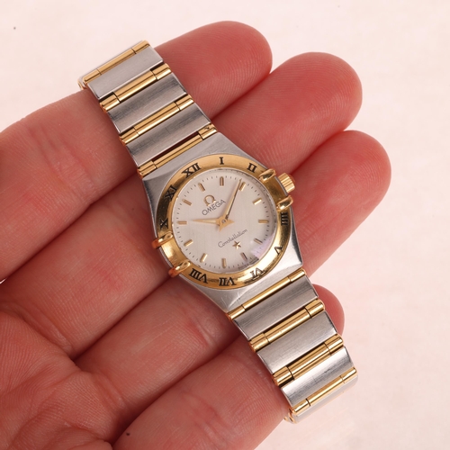 1031 - OMEGA - a lady's stainless steel and gold Constellation quartz bracelet watch, ref. 795.1203, circa ... 