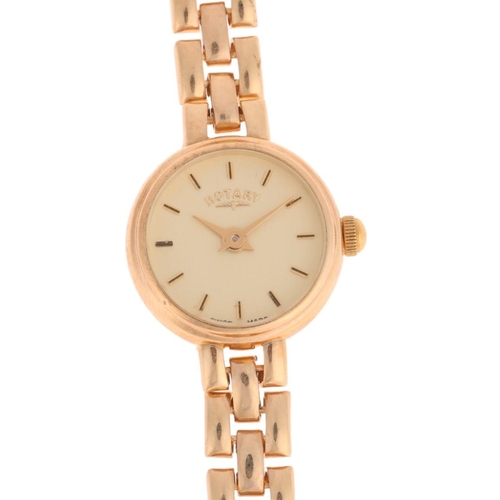 1038 - ROTARY - a lady's 9ct gold quartz bracelet watch, champagne dial with baton hour markers, lance hand... 