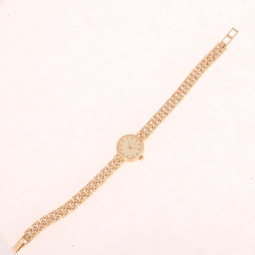 1038 - ROTARY - a lady's 9ct gold quartz bracelet watch, champagne dial with baton hour markers, lance hand... 