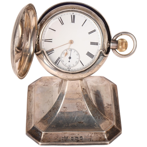 1053 - An early 20th century silver pocket watch stand, Fraget & Co, Birmingham 1913, reg. no. 622523, with... 