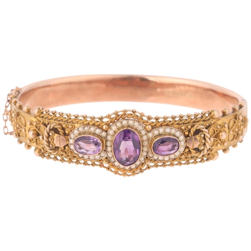 1110 - An Antique 9ct rose gold amethyst and split pearl Etruscan Revival hinged bangle, maker JS, Birmingh... 