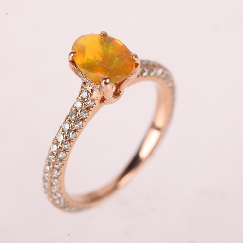 1122 - An 18ct rose gold fire opal and diamond ring, set with 0.4ct oval mixed-cut fire opal, with pave set... 